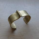 nishnabotna jewelry, wide brass furrow cuff bracelet with bend